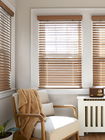 Real wood blinds with a valance, adding natural warmth, elegance, and polished style to any window