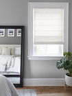 Roman shades in a bedroom, adding elegance, privacy, and soft light control for a cozy, stylish space