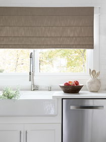 Kitchen window treatments above the sink from the Johnny Curran Collection blend style and functionality