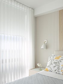 Sheer shades as bedroom window treatments, providing soft light control, privacy, and an elegant, airy look