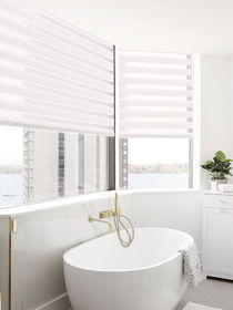 Zebra shades for bathroom window treatments, offering stylish light control, privacy, and a contemporary design