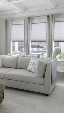 Drapery paired with cellular shades