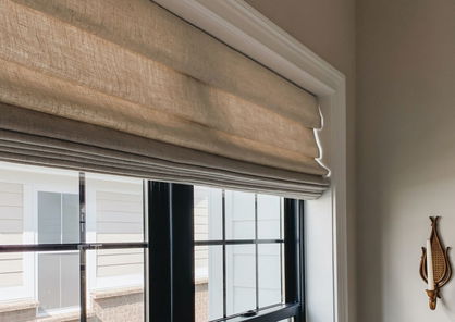 Inside mount roman shades in tan linen with light-filtering lining