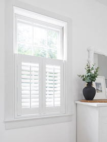 Window shutters offering classic style, enhanced privacy, and adjustable light control for any room