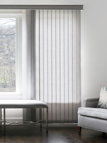 Vertical blinds in a living room, offering sleek design, easy light control, and a modern touch to large windows